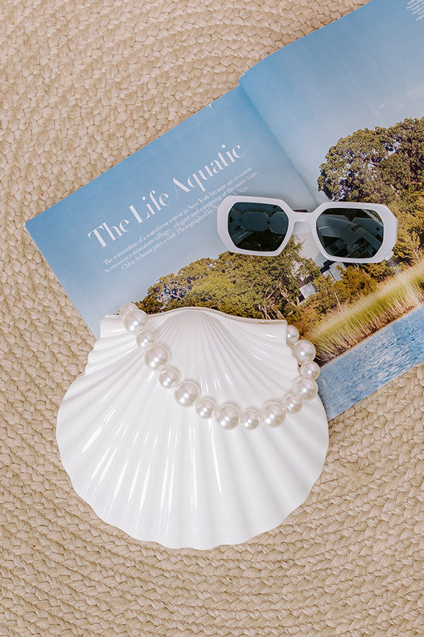 The Ultimate Ariel Clutch: Premium Beach Accessory