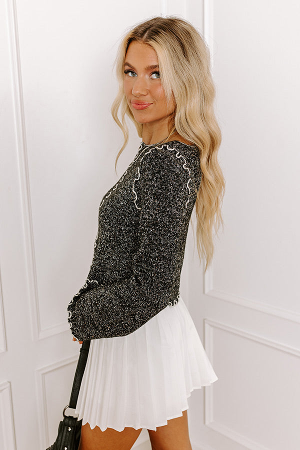 Ultimate Cozy Black Knit Top with Ruffled Details